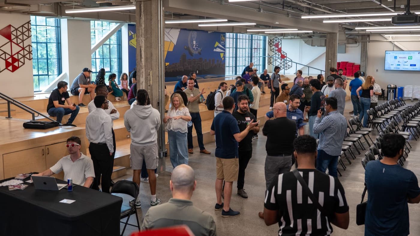 Founders, builders, and investors mingling at the start of a Spark AI networking night